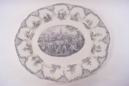 A 19th century English porcelain oval platter, printed in grey with Chinoisere figures, 41cm wide,