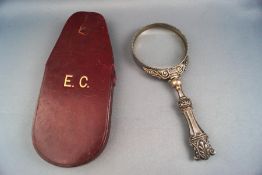 An Edward VII silver mounted magnifying glass, engraved with the initials "E.C" 15.