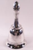 A Dunhill silver plated cocktail shaker in the form of a bell,