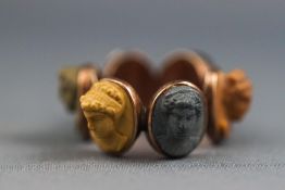 A rare carved multicolour cameo mourning ring. Tests indicate 9ct gold. Size: N 4.