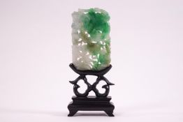 A Chinese jade panel, pierced and carved with a beast and a crane, 7cm x 4.