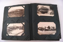 Two albums of Victorian and early 20th century postcards and photographs, including greetings,