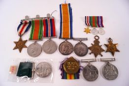 A quantity of WWI & WWII medals, comprising: George V and Victory,