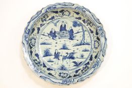 A substantial Chinese porcelain blue and white dish with shaped edge,