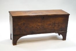 A George III elm six plank coffer with original hinges and candle box, later period lock, two keys,