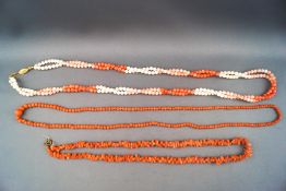 A selection of three coral necklaces of variable colour and design. Gross weight; 74.