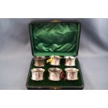 A set of six silver napkin rings, Birmingham 1912, 3.