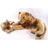 A Steiff lion with plush golden blonde hair and mane, no label or button, 63cm long,