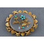 A Victorian gold and chalcedony oval brooch,