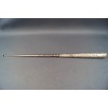 A large Victorian silver handled button hook,