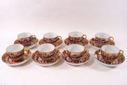 A 19th century Crown Derby style porcelain part tea and coffee set, comprising ten cups,