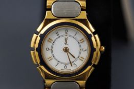 An Yves Saint Laurent lady's stainless steel and gilt bracelet watch, circa 1988,