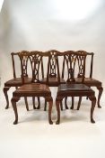 A set of five George III style mahogany dining chairs,