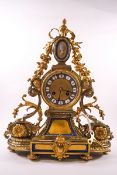 A late 19th/early 20th century French mantel clock, the eight day movement striking on a bell,