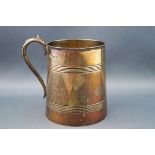 A silver half-pint mug,