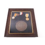 A WWI death penny and three medals (Victory, George V and 1914-15 Star) named to George Attwood,