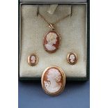 A yellow gold Cameo jewellery set consisting of a pendant with chain,