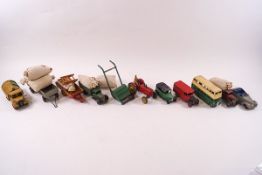 A collection of Dinky die cast vehicles, including a Massey Harris tractor, Royal Mail van,