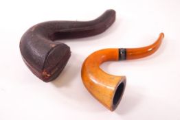 A meerschaum pipe with haled clay bowl, the silver collar, Birmingham 1934, length 15cm,