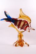 A Murano glass fish with red striped yellow and blue body, 27.