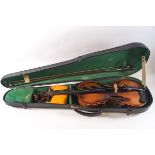 A 19th century one piece back violin, labelled Joan Kloz, Mittenwald, 14" back excluding button,