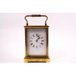 A Victorian brass presentation carriage clock, the enamel dial signed Oldfield, Liverpool,