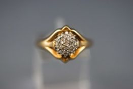 A 9ct gold and diamond cluster ring, the 34 eight-cut,