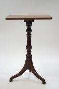 A George III style mahogany wine table on turned column and out swept legs, 70cm high x 44.