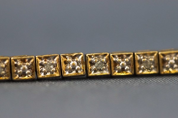 A 9ct gold and diamond ‘tennis’ bracelet, post 2000 convention marks, 5. - Image 2 of 2