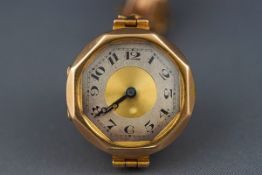 A 9ct yellow gold cased ladies wristwatch with bi colour full figure dial. Mechanical movement.