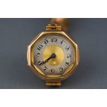 A 9ct yellow gold cased ladies wristwatch with bi colour full figure dial. Mechanical movement.