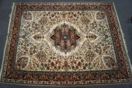 A Persian style machine woven rug,