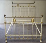 A Victorian painted cream and gilt iron single bed, the headboard 127cm wide,