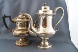 A Sheffield Plate coffee pot with ebonised handle, height 23cm and another silver plated coffee pot,