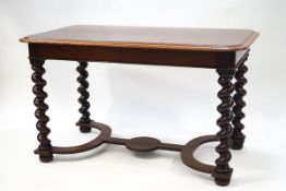 A late Victorian mahogany centre table on heavy barley twist legs with two drawers,