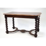 A late Victorian mahogany centre table on heavy barley twist legs with two drawers,