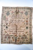 A 19th Century sample by Sarah Ann Russell, aged 10 embroidered with trees,