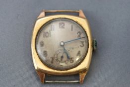 An early 20th century gold watch face. Round champagne full figure dial. Mechanical movement.