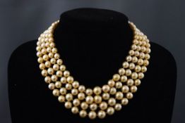 A cultured pearl four row choker with a ruby and diamond clasp, the graduated rows of 43, 43,