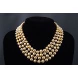 A cultured pearl four row choker with a ruby and diamond clasp, the graduated rows of 43, 43,
