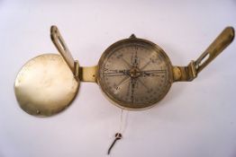 A 19th century brass miners dial by W & S Jones, Holborn, with cover and key,