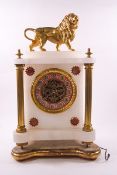 A late 19th century marble mantel clock with visible escapement,