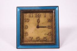 An early 20th century enamel strut bedside clock, 8.