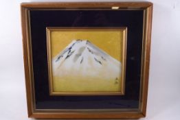 A Japanese enamel plaque of Mount Fuji, signed, within a framed and glazed case, 42.5cm x 45.