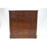 A Victorian mahogany chest of two short and three long graduated drawers with turned handles,