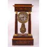 A 19th century rosewood Portico clock in the Empire style with box wood line and floral inlays,