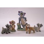 Three Wade porcelain figures from Lady and the Tramp, and another two of Tom and Jerry,