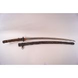 An early 20th century Japanese Katana and scabbard with cotton bound shagreen grip
