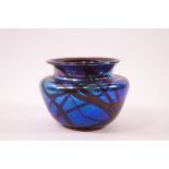 A Studio glass vase by Siddy Langley, linear design to a blue lustre ground,