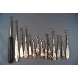 Fourteen small Victorian and later button or glove hooks,